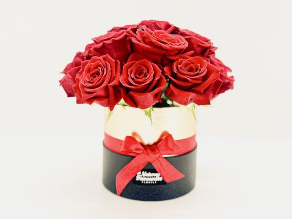 cute red roses in box