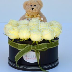yellow roses with teddy bear