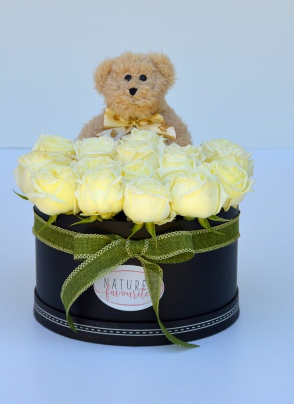 yellow roses with teddy bear